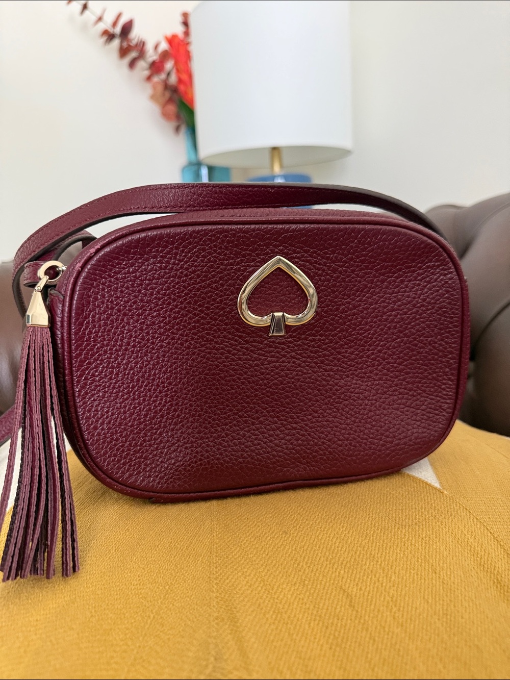 kate spade maroon/purple pebbled leather tassel crossbody bag
